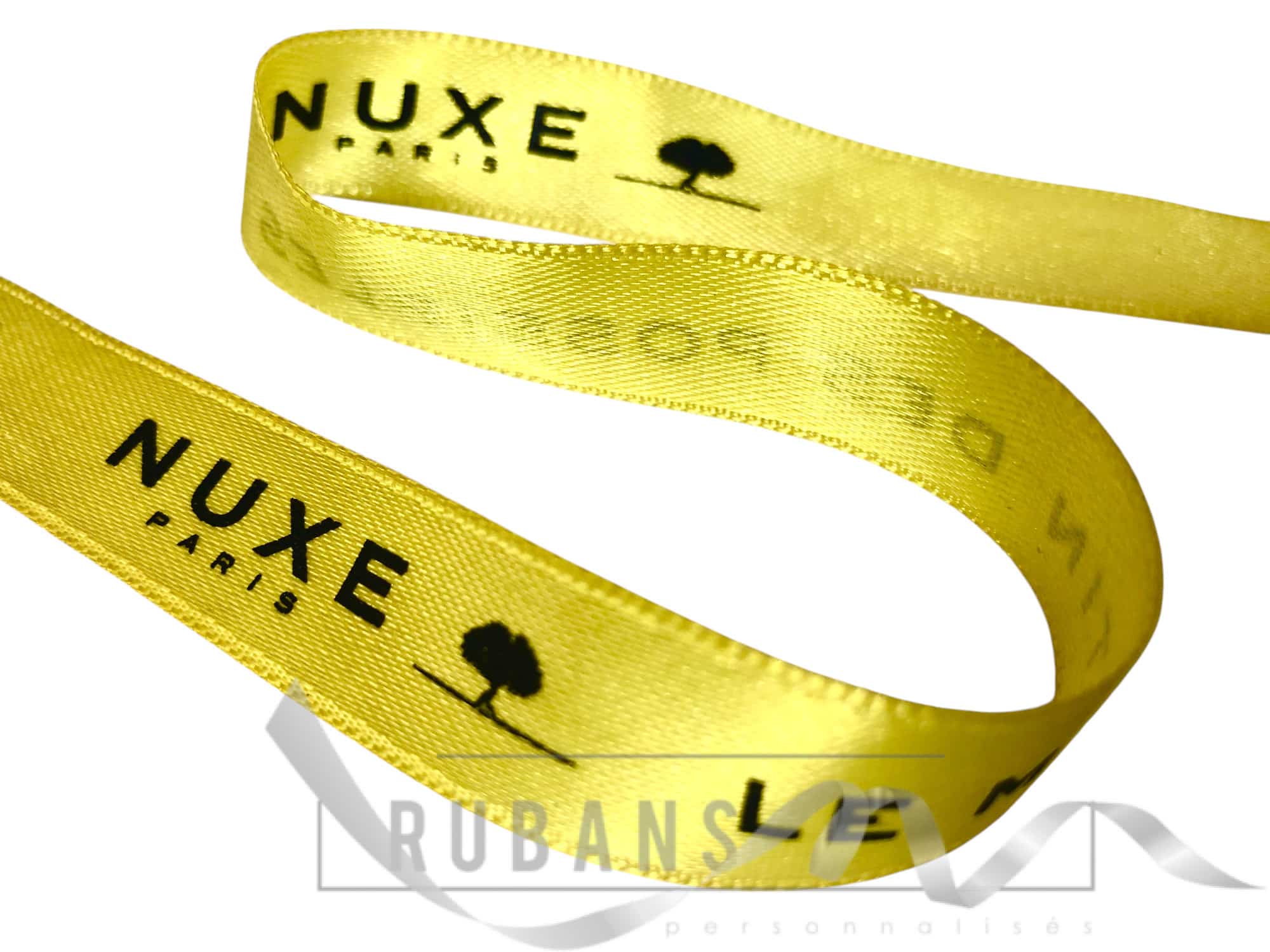 ruban jaune logo NUXE PARIS